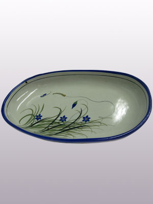 Butterfly Dinnerware / 'Blue Rim Butterfly' Oval Serving platter / With a handcrafted design, this serving platter is perfect for fruit display on a table or serving the main dish. It is adorned with a butterfly, flowers and grass bordered with a cobalt blue rim.