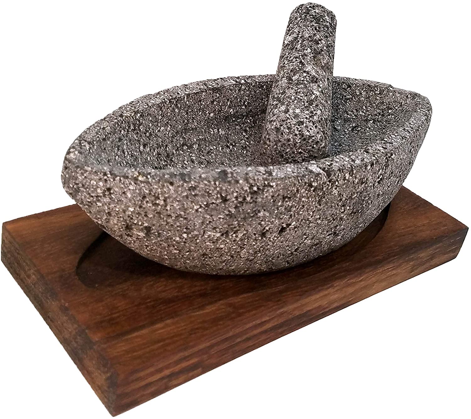 PRODUCTOS DE PIEDRA VOLCANICA / Canoe Shaped Mortar and Pestle Set with Parota Wood Serving Board / Enhance your table setting with this original canoe-shaped mortar and pestle set with included wood serving board, as it is eye-catching, yet functional.