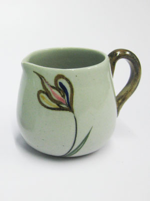 MEXICAN STONEWARE / 'Tulip' Creamer / Ideal for a midday coffee or tea with friends, this creamer is adorned with a multicolor tulip.