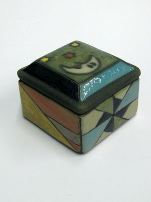 MEXICAN RAKU CERAMICS / Small square jewelry box / A moon and stars enlight the lid of this handpainted square jewel box. Made of Raku ceramic, it features multicolor geometric figures on the sides.